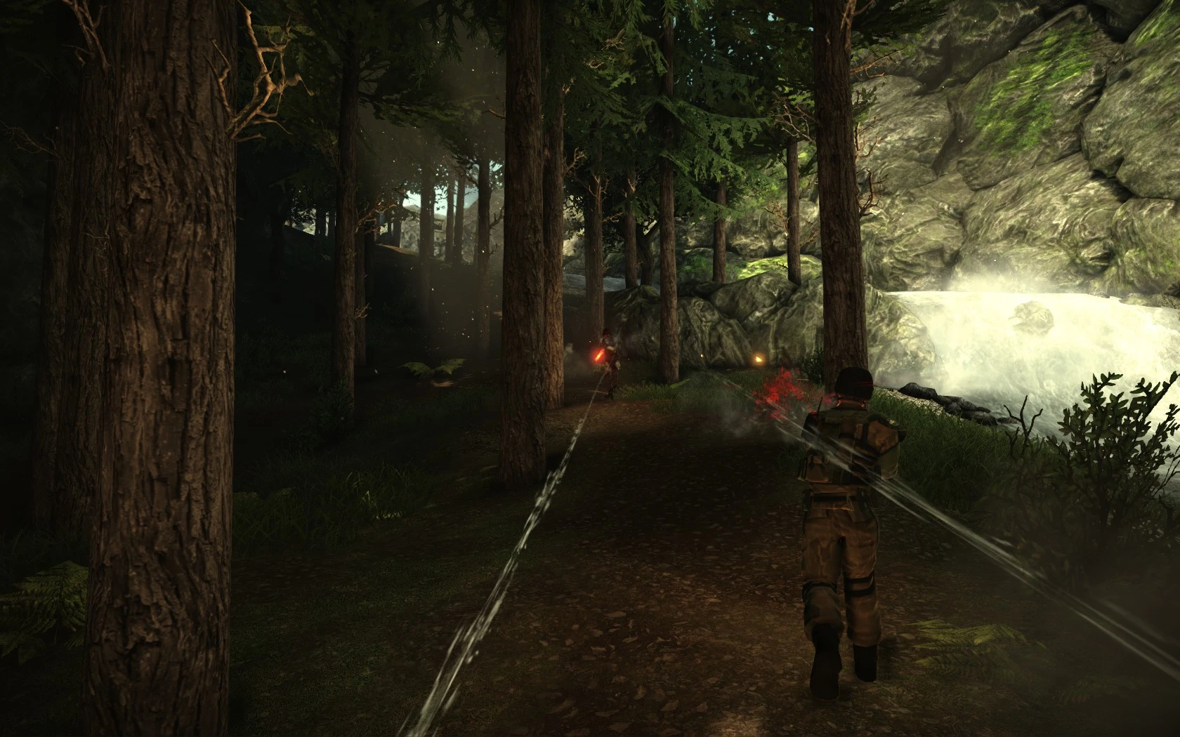 Dos soldados disparando a lo largo de un camino forestal cerca de una cascada en Renegade X