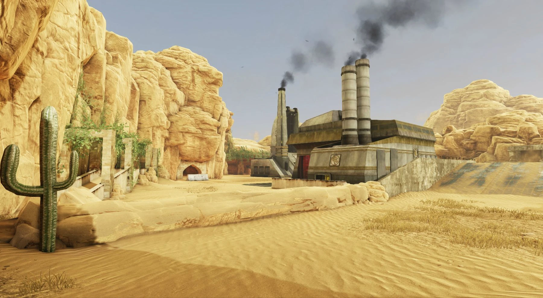 Paisaje desértico arenoso con edificios industriales que emiten humo en el juego Renegade X