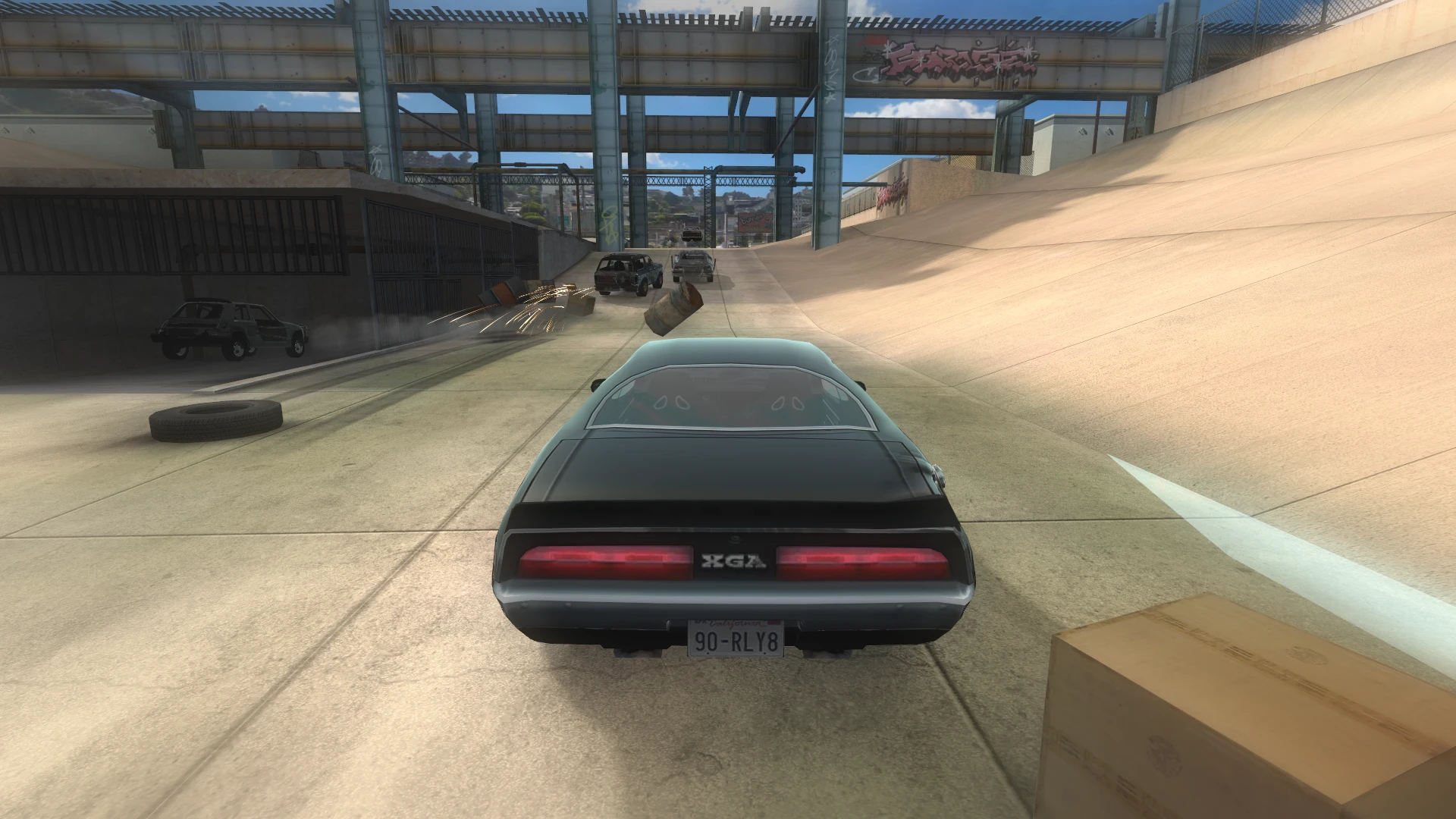 Rear view of a muscle car racing in a concrete drainage channel with obstacles and other cars ahead