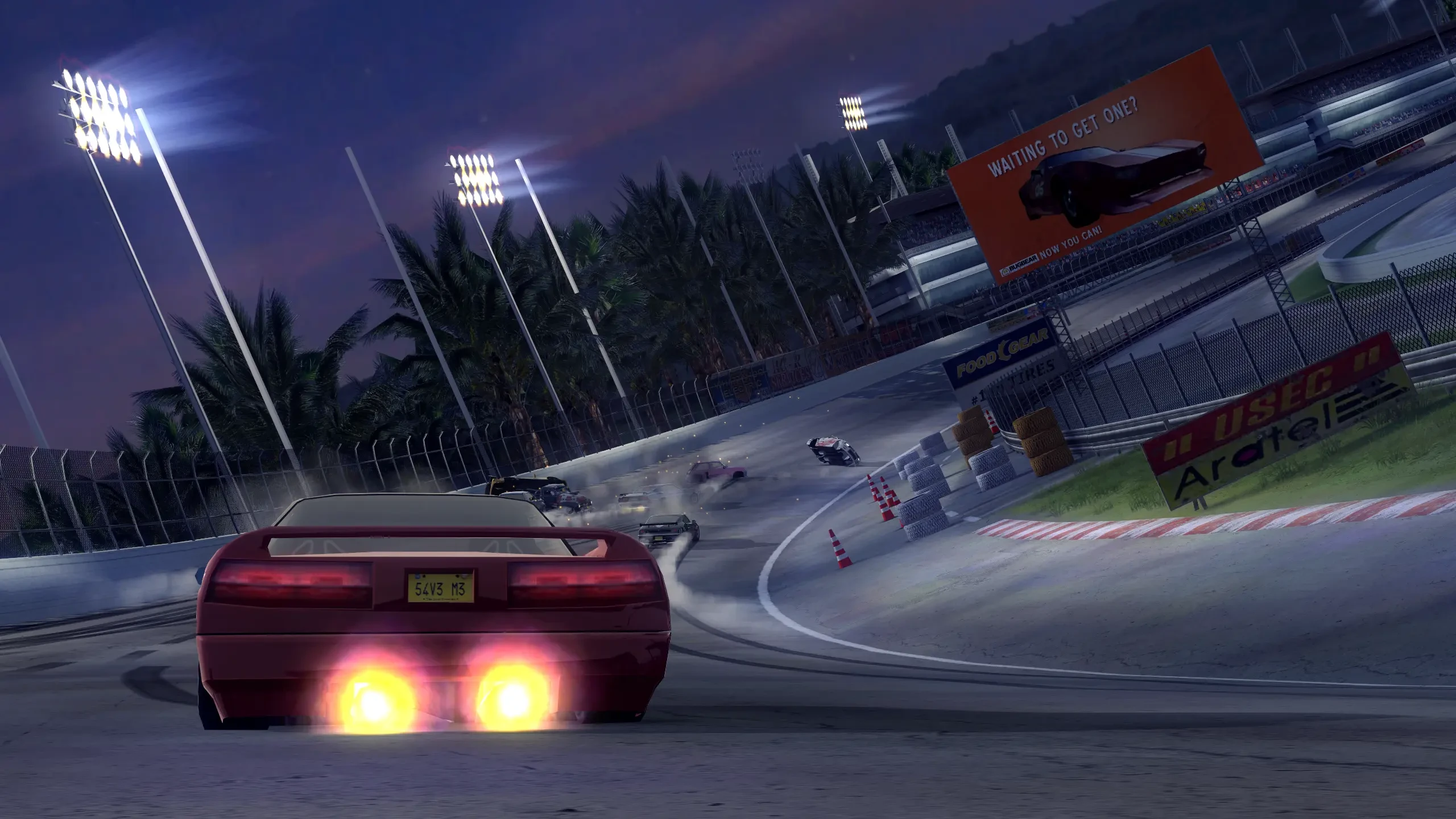 Скріншот з FlatOut 2 із червоним спортивним автомобілем у дрифті на освітленій нічній гоночній трасі, на тлі інших машин