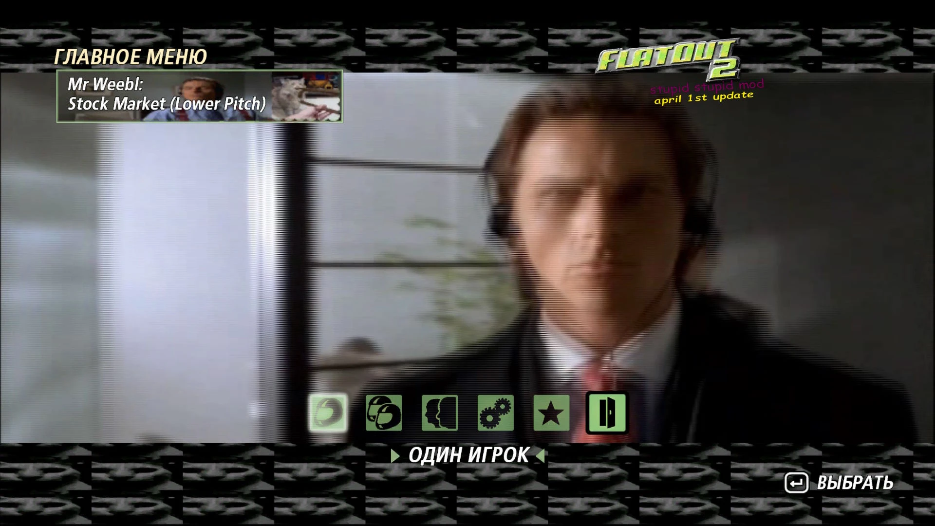 Niewyraźny ekran głównego menu FlatOut 2 z modem Stupid Stupid Mod i tekstem aktualizacji z kwietnia