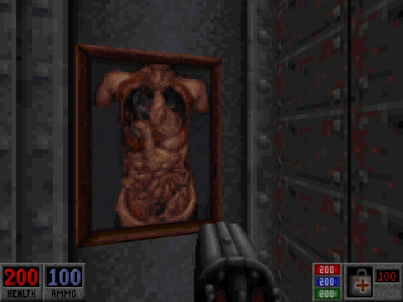 Widok z perspektywy pierwszej osoby z strzelbą skierowaną na oprawiony makabryczny obraz torsu na metalowej ścianie w Blood 1997