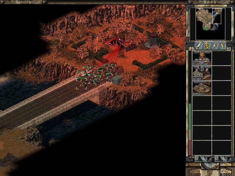 Infanterieeinheiten greifen nahe einem roten Nod-Signal auf einer Brücke in Command & Conquer Tiberian Sun an