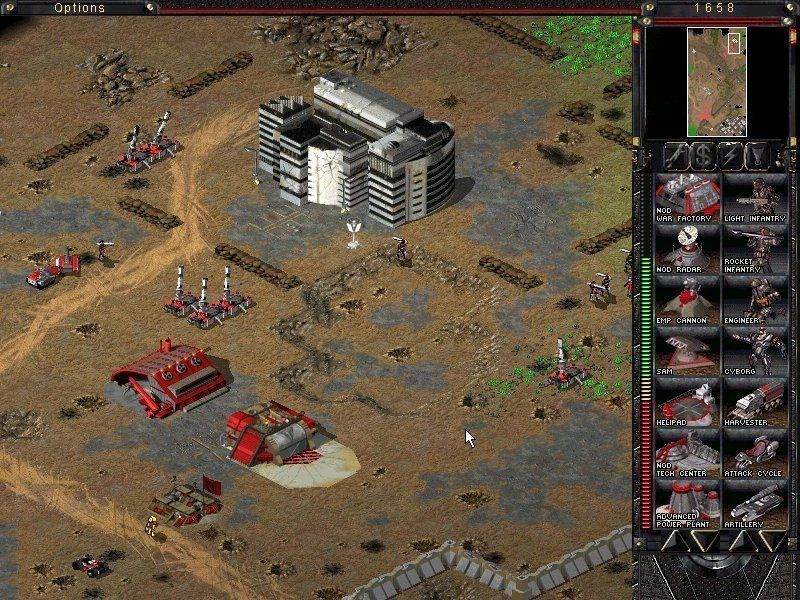 Draufsicht auf Nod-Basis mit Kriegsfabrik, Radar, Kraftwerk und Infanterieeinheiten in Tiberian Sun