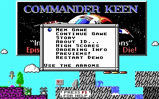 Menú del juego Commander Keen Episodio III mostrando opciones como nuevo juego, continuar y más sobre fondo pixelado