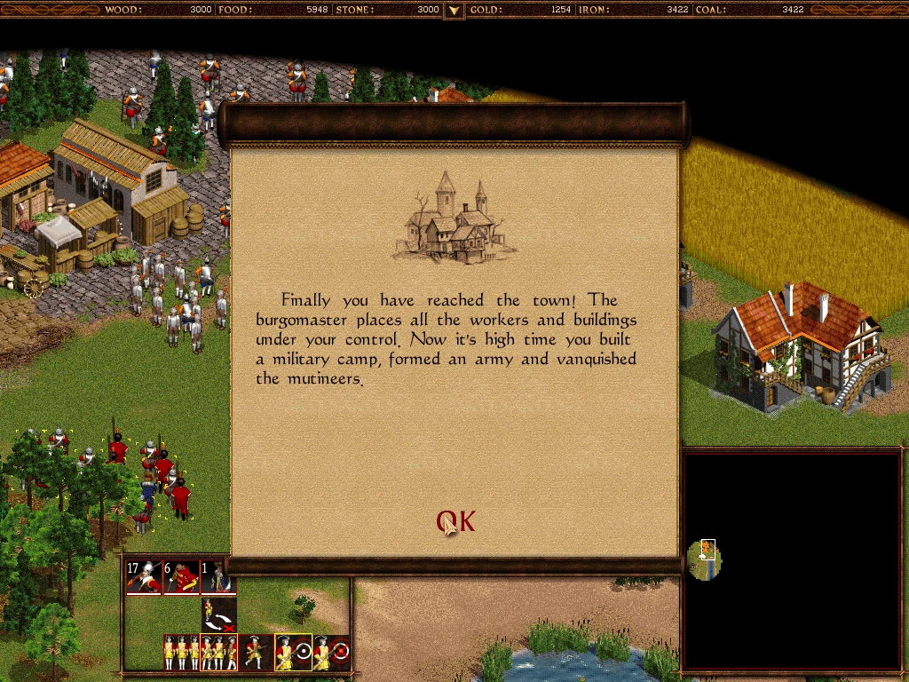 Ekran gry z komunikatem o dotarciu do miasta i budowie obozu wojskowego w Cossacks The Art of War