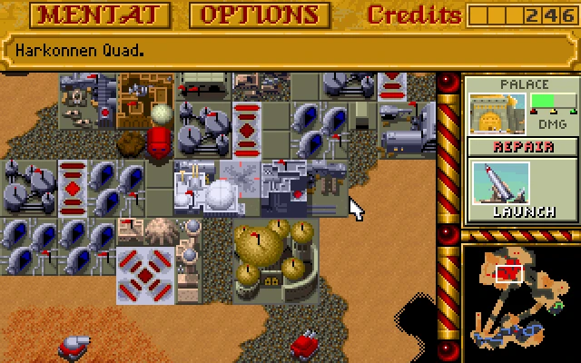 Top-down view of Harkonnen base with buildings and interface showing repair and launch options in Dune II