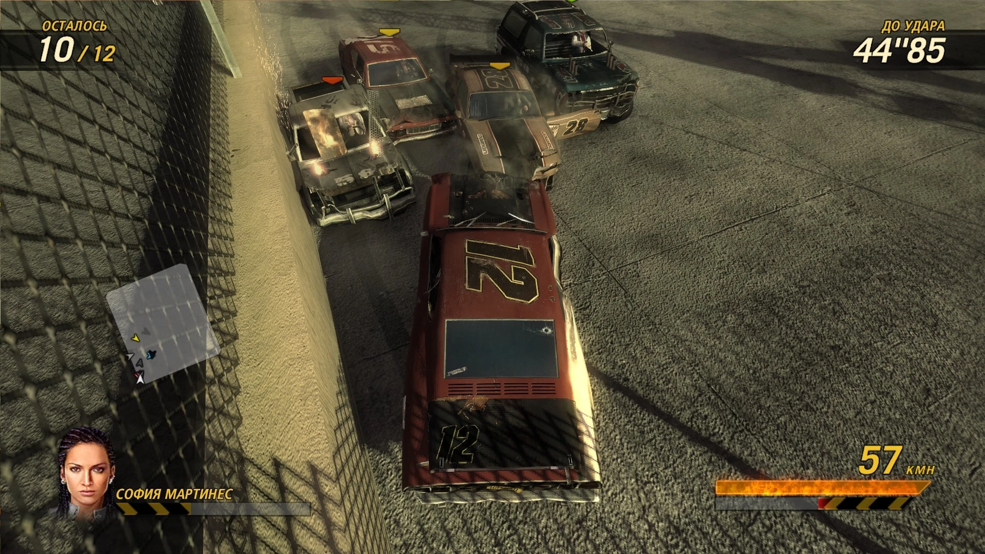 Overhead view of multiple crashed cars in a tight demolition derby race in FlatOut Ultimate Carnage