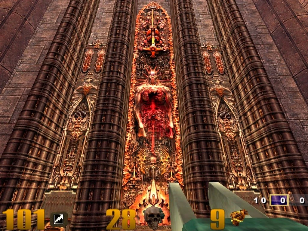 Spielansicht mit detaillierter, feuriger Dämonenstatue hinter hohen Säulen in Quake III Arena
