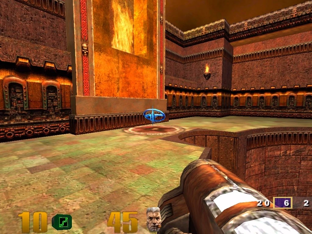 Ego-Perspektive in Quake III Arena mit Raketenwerfer, der auf eine feurige Wand in einer Arena zielt
