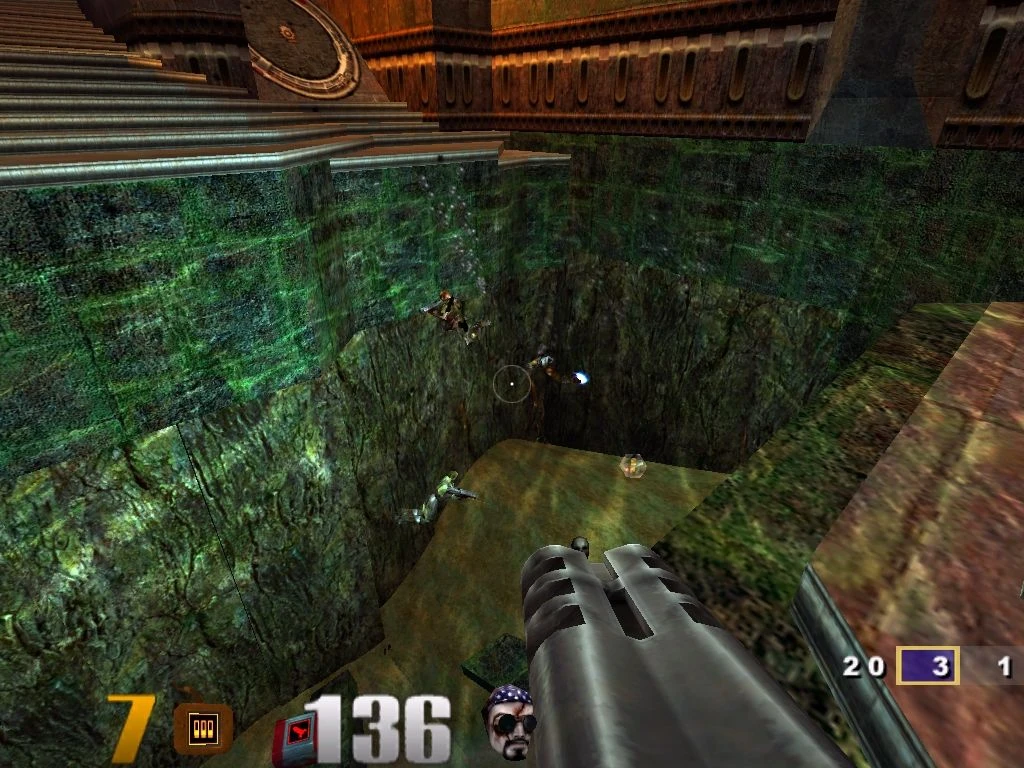 Erste-Person-Ansicht eines Spielers mit Raketenwerfer, der Gegner in einer felsigen Grube in Quake III Arena beobachtet