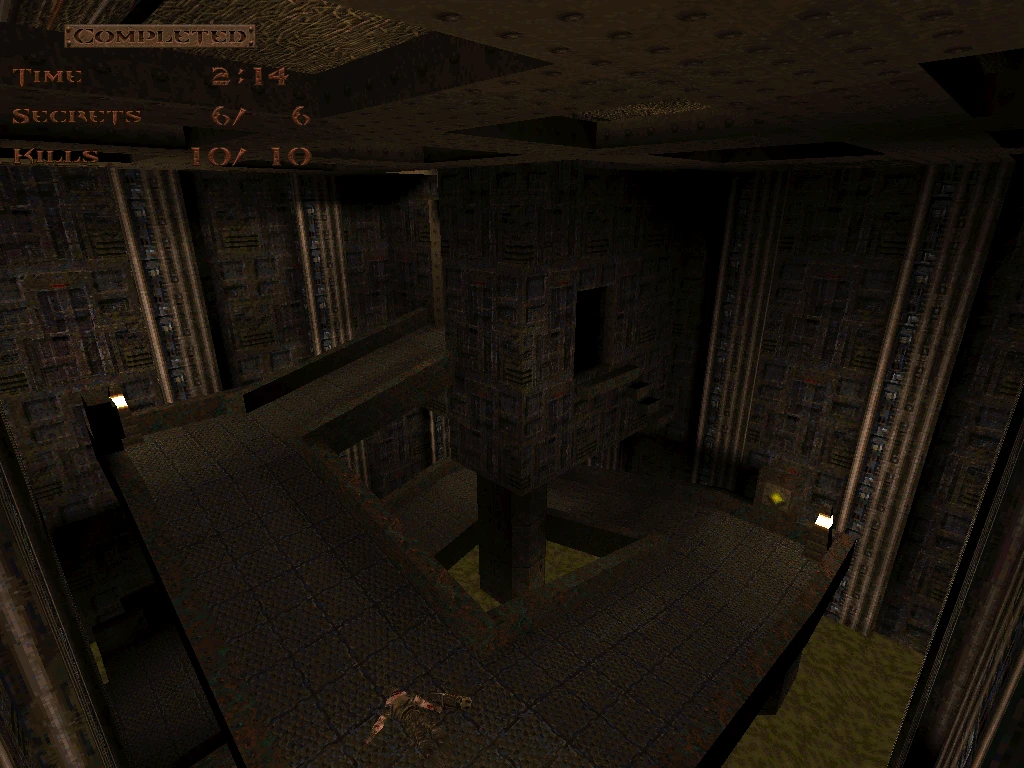 Nivel industrial oscuro de Quake mostrando pantalla de fin con 6 secretos y 10 eliminaciones