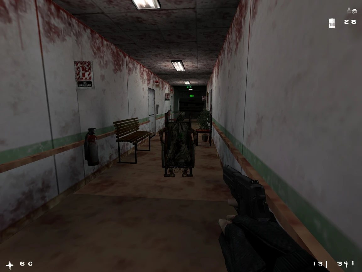 Ego-Perspektive mit Waffe auf dunkle Gestalt im Rollstuhl in düsterem Krankenhausflur im Half-Life Mod Afraid of Monsters