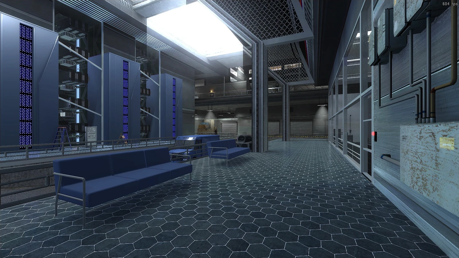 Industrial hallway with hexagonal tiled floor, blue benches, metal railings, and tall server racks in Half-Life Diffusion mod