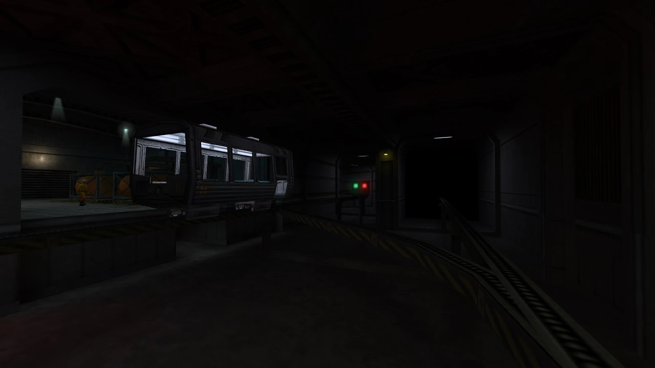 Wnętrze ciemnego podziemnego tunelu z zaparkowanym wagonem pociągu i dwoma świecącymi sygnałami w modzie Half-Life: Chain Reaction