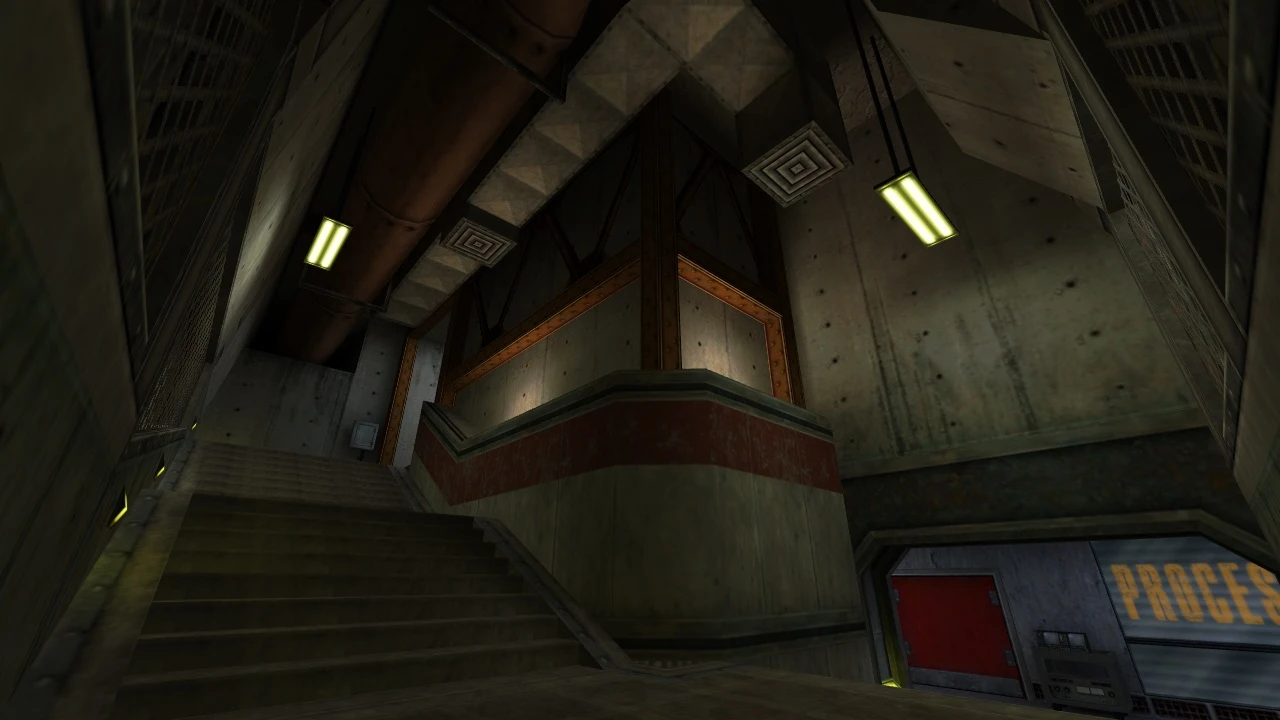 Zrzut ekranu przedstawiający przemysłowe schody i betonowe ściany wewnątrz obiektu w modzie Half-Life Chain Reaction