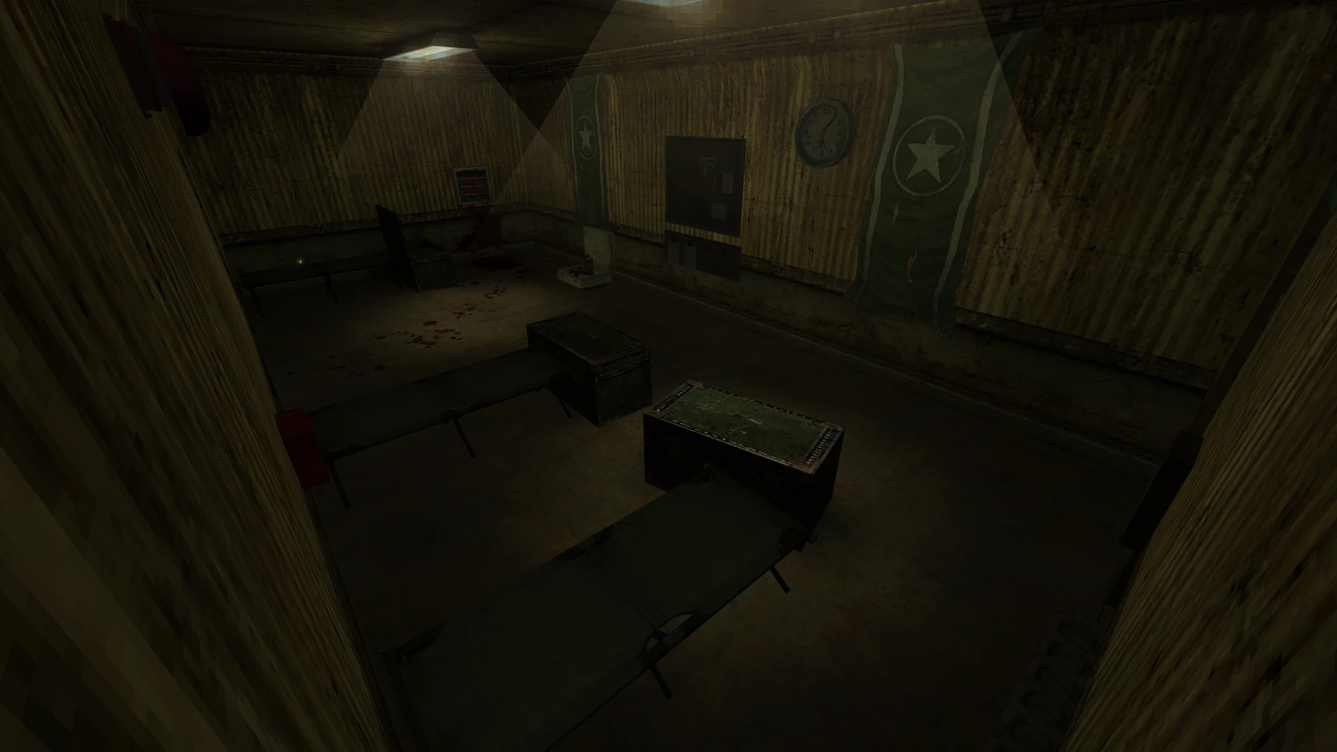 Dimly lit military barracks room with cots, crates, and blood stains in Half-Life Deep Cover mod