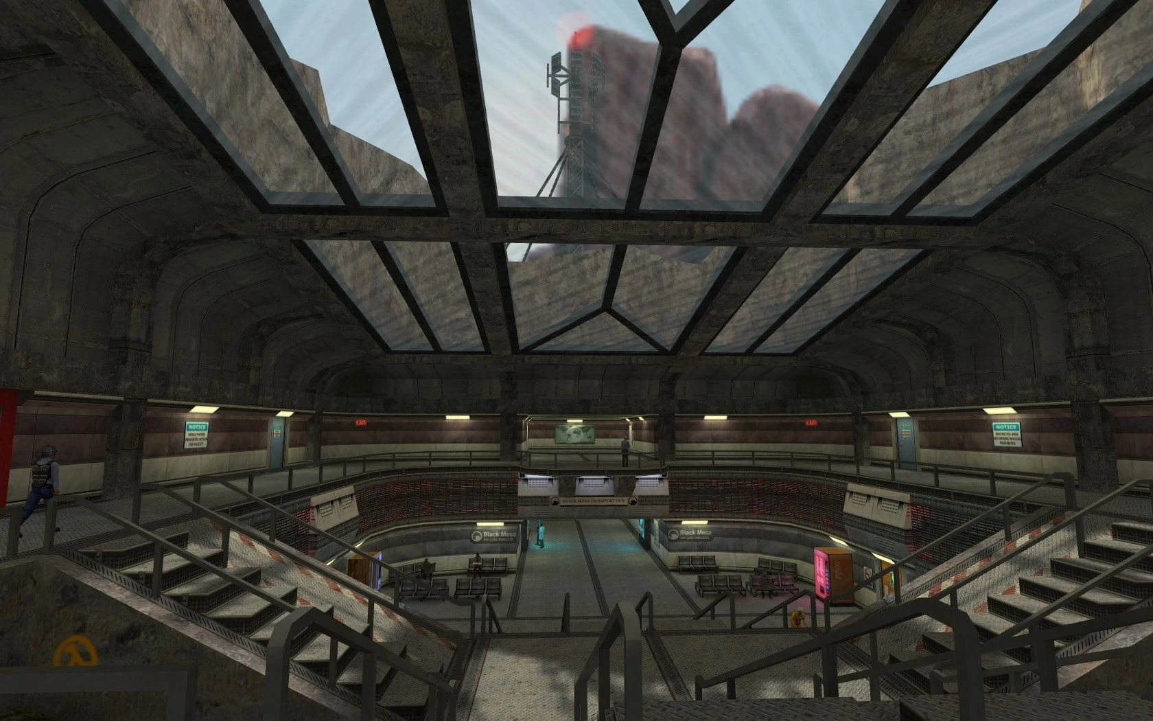 Внутрішній вигляд транспортного вузла Black Mesa з сходами, зонами очікування та скляною стелею з видом на зовнішню вежу