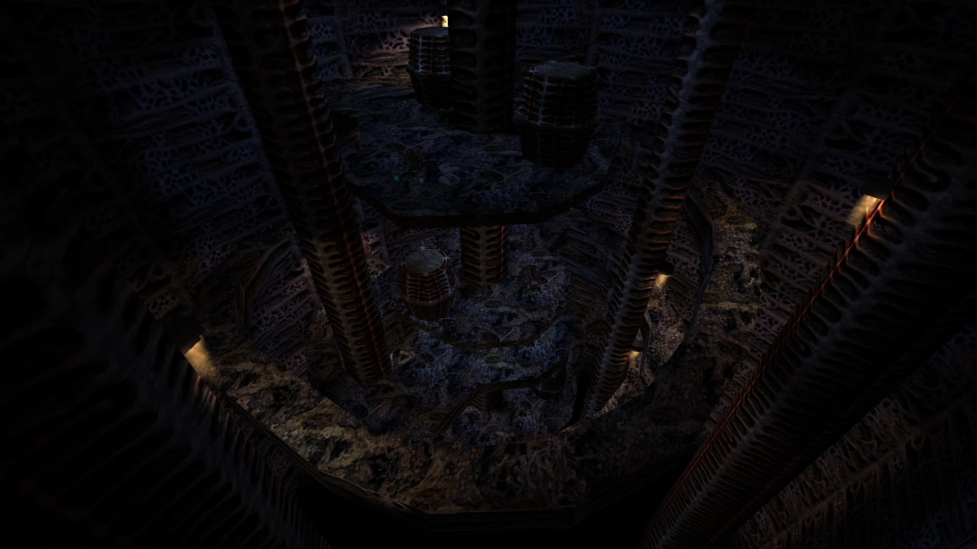 Captura de pantalla de una caverna oscura con paredes de textura alienígena y varias plataformas circulares conectadas por pilares en el mod Half-Life
