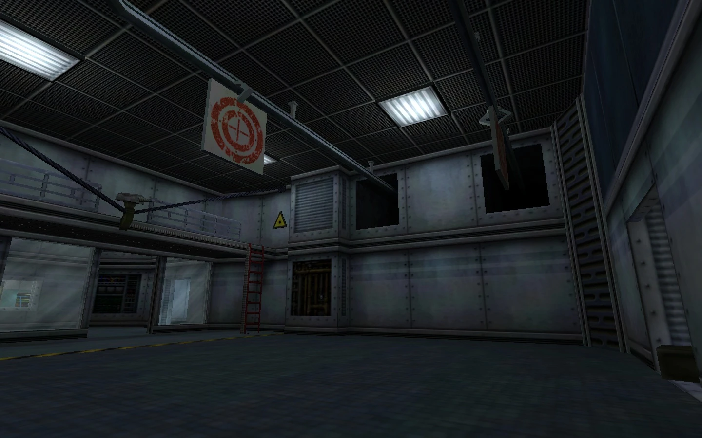 Sala industrial con paredes metálicas, escalera roja y señales de advertencia en Half-Life Field Intensity