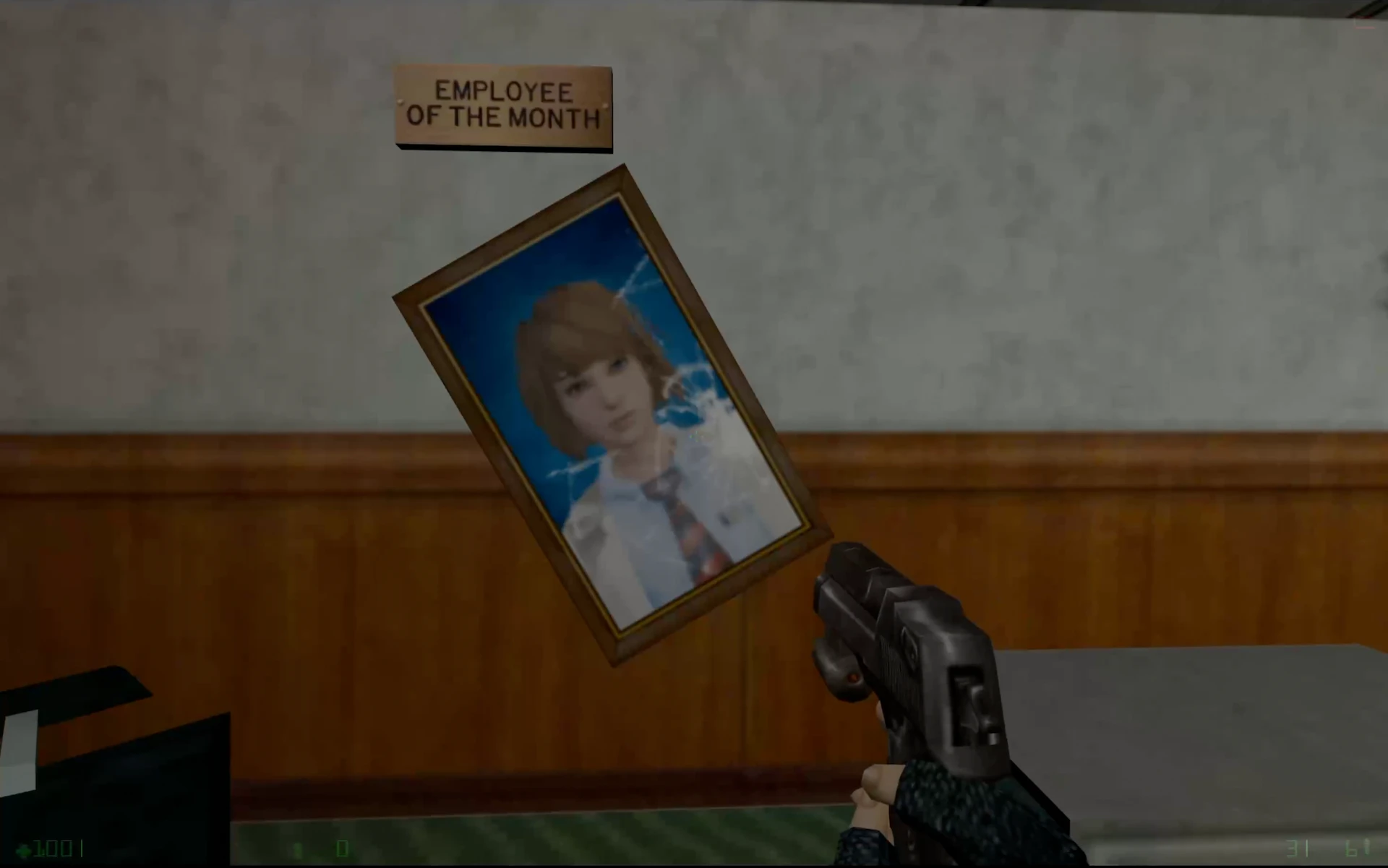 In-game screenshot showing a cracked framed portrait labeled Employee of the Month held by a character with a pistol