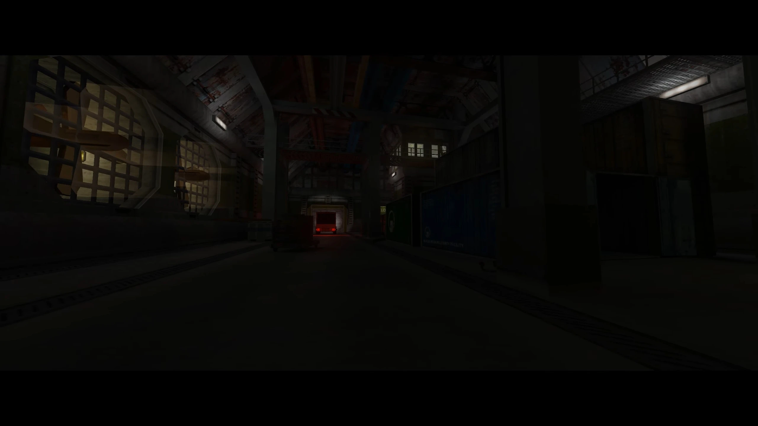 Dimly lit industrial corridor with metal grates, crates, and red light at the end in Half Life NO - HOPE mod