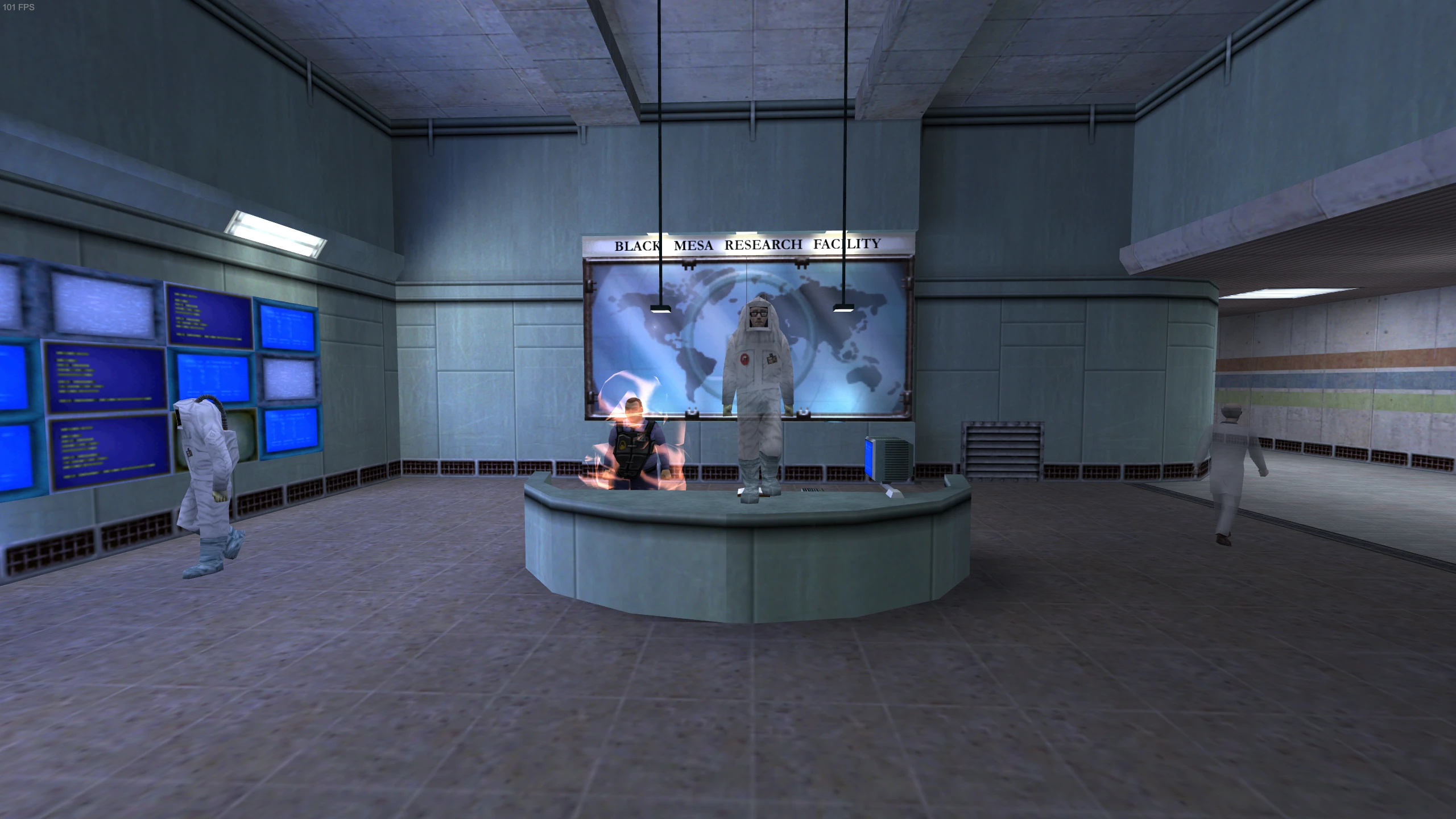 Wnętrze ośrodka badawczego Black Mesa z postaciami w kombinezonach ochronnych i naukowcem za biurkiem