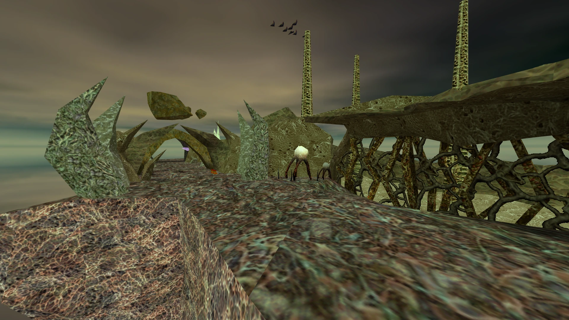 Obcy biom z dziwnymi strukturami i unoszącymi się skałami pod ponurym niebem w modyfikacji Half Life Savior Complex