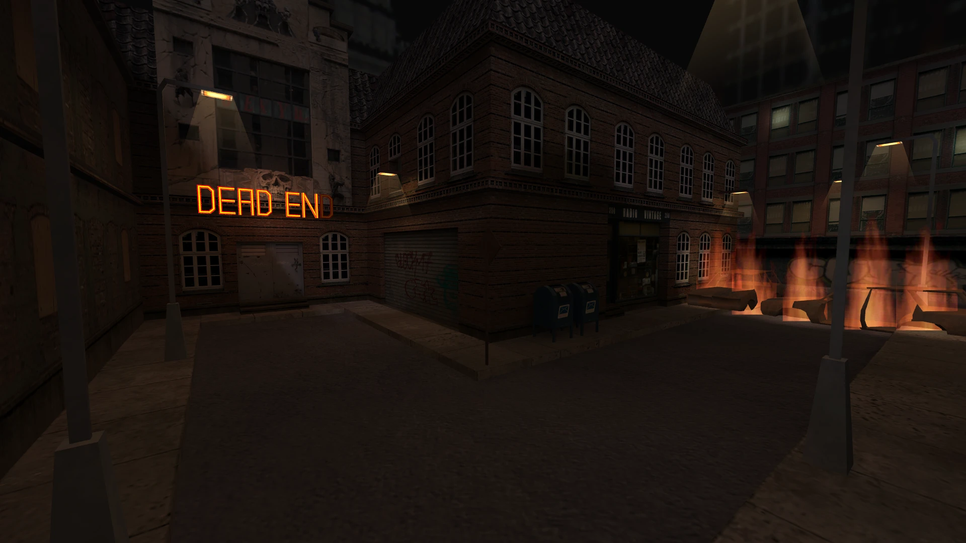 Vista nocturna de una calle en esquina en el mod de Half-Life con un letrero de neón 'Dead End' y barricadas en llamas