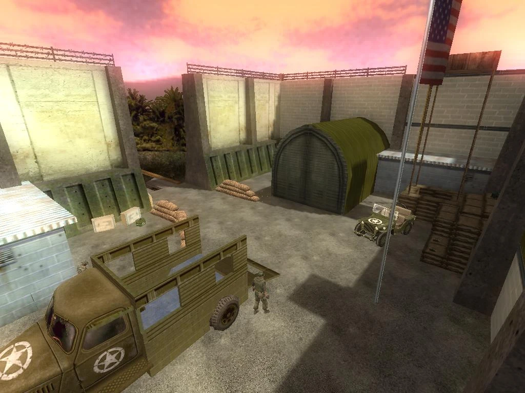 In-game view of a military compound with vehicles, sandbags, and tents under a sunset sky in Half-Life mod
