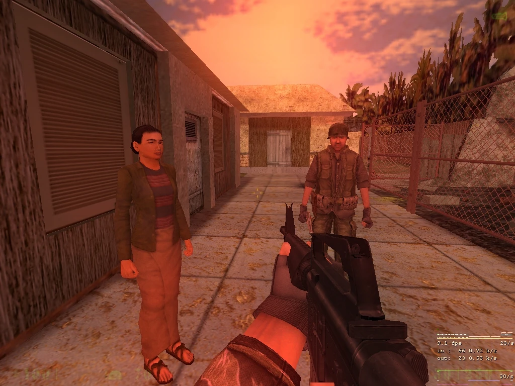 First-person perspective aiming a rifle at two characters standing outside near buildings at sunset in Heart Of Evil mod