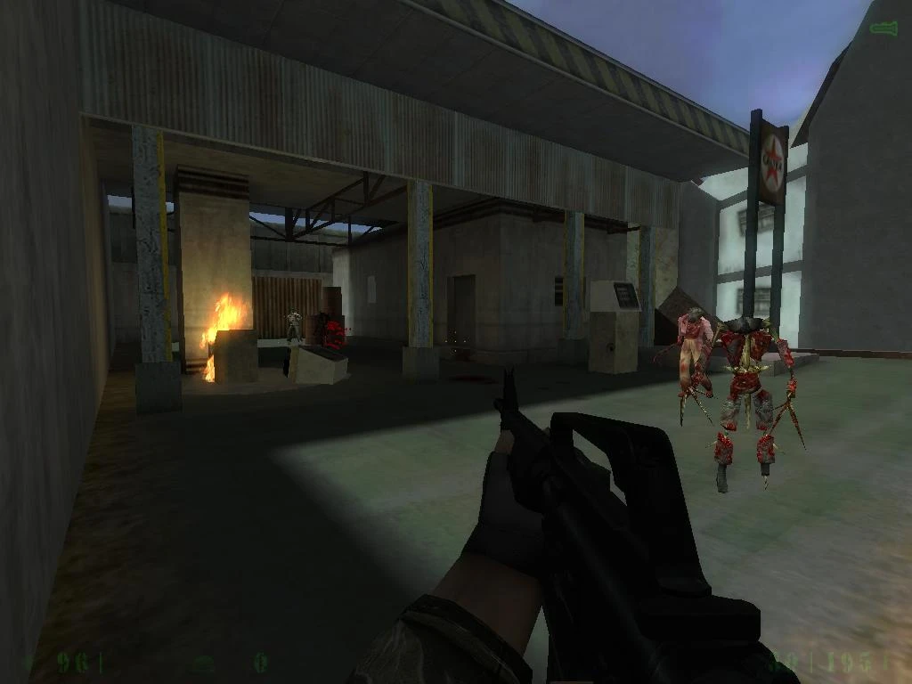 First-person view of player holding rifle facing two grotesque creatures near burning pillar in Half-Life mod