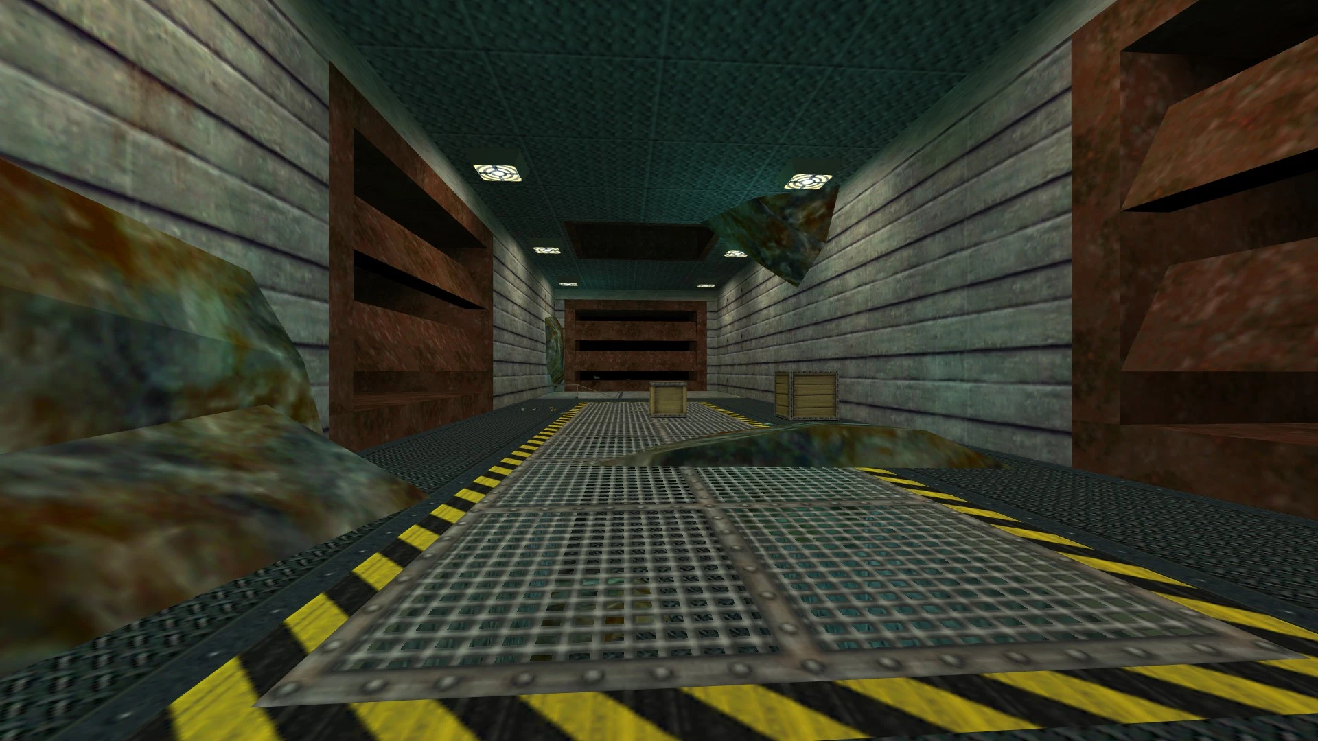 View of metal grated floor and two wooden crates in an industrial tunnel environment from Half-Life mod