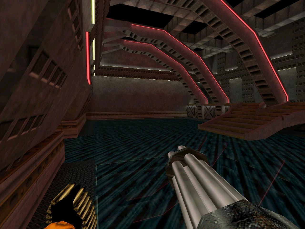 Vista de un interior industrial futurista con escaleras metálicas y luces rojas, jugador sosteniendo minigun en mod Half-Life