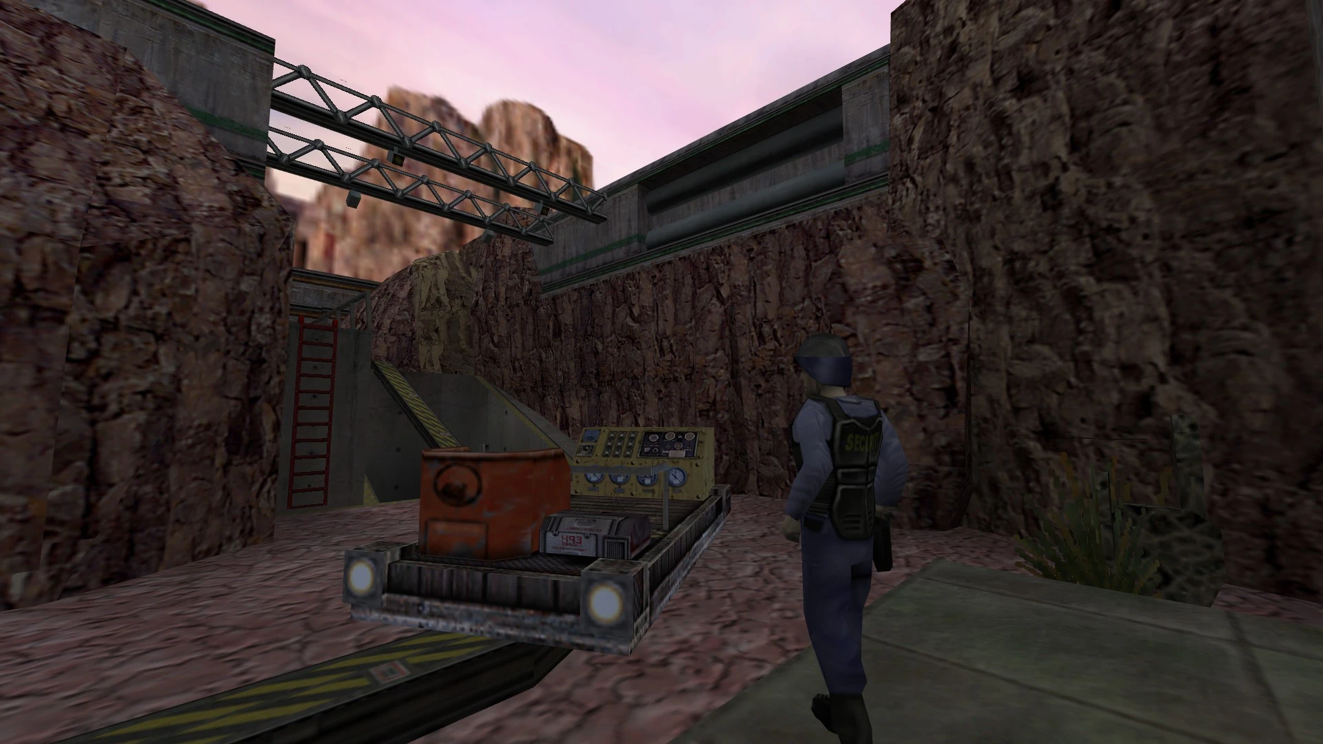 Mod Half-Life Reprocessing z ochroniarzem przy panelu kontrolnym i taśmociągu w skalistym kanionie