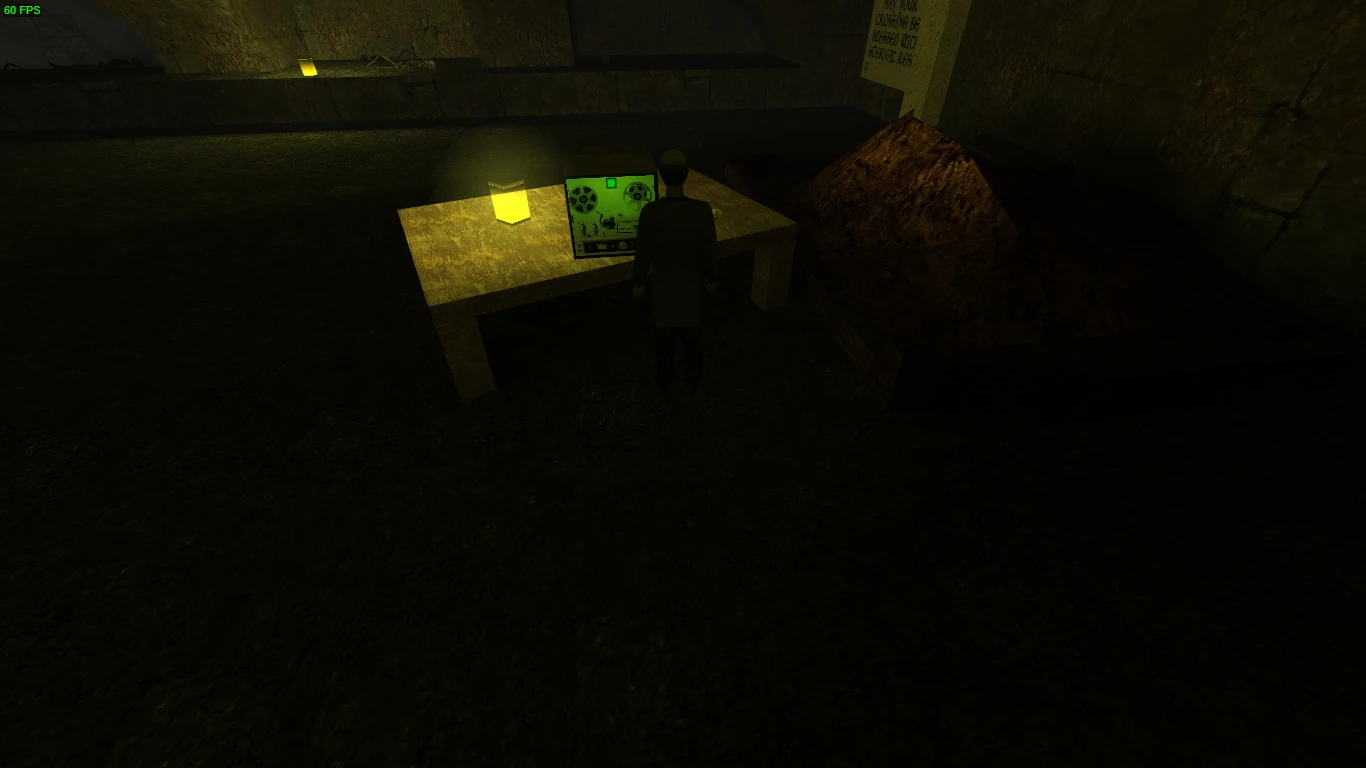 Character in dark catacombs standing near glowing green tape recorder on wooden table
