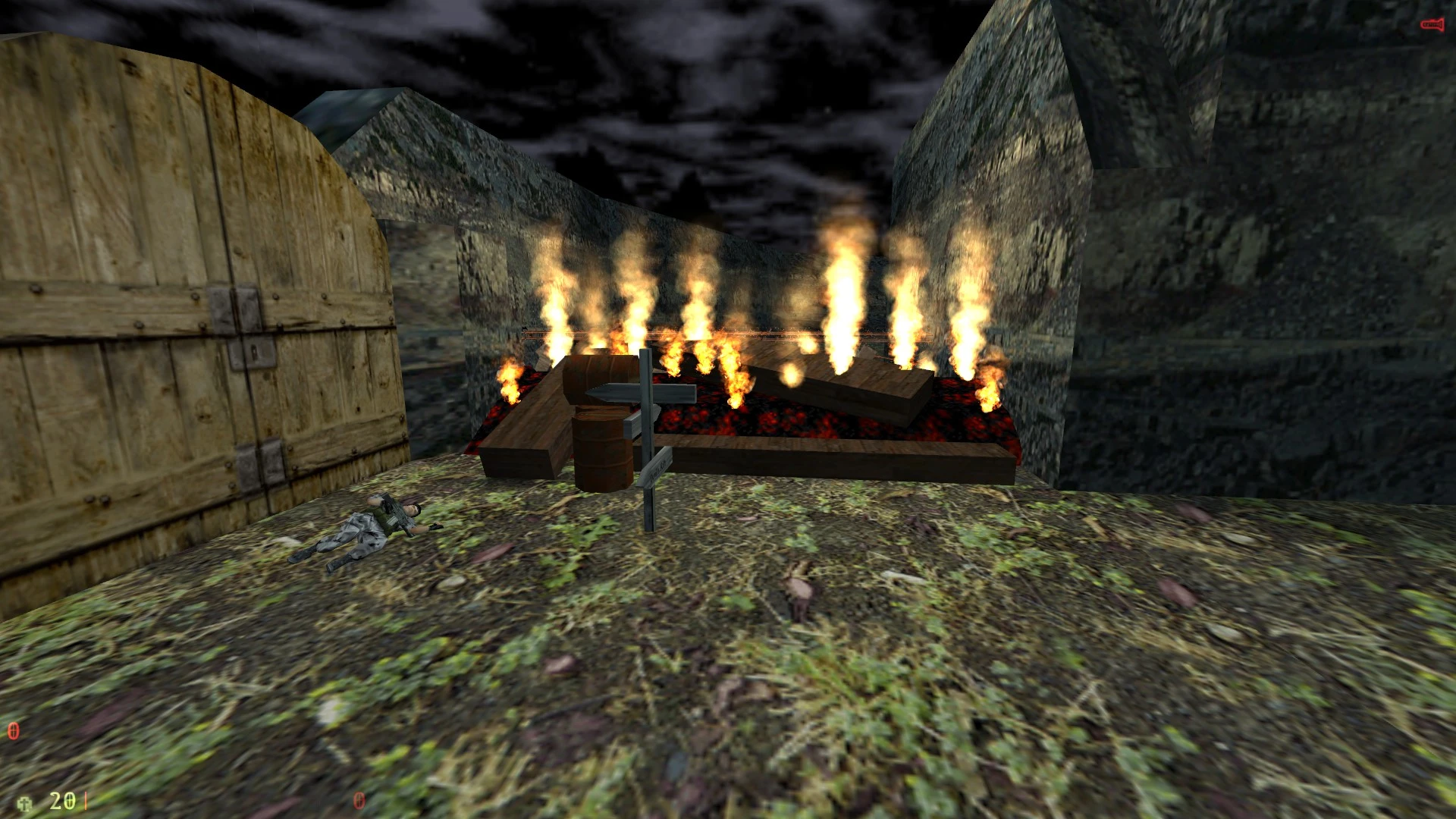 Feuergrube Falle mit Flammen in einem steinernen Korridor und gefallener Soldat im Half-Life Survive in Catacombs Mod
