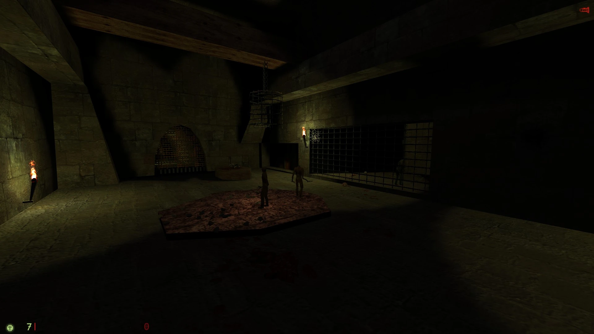 Dunkles Steinkatakomben-Interieur mit Fackeln und feindlichen humanoiden Figuren nahe einem Gitter im Half-Life-Mod