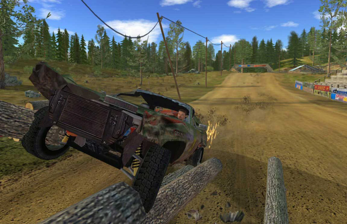 Screenshot from Textures mod: a damaged car tilted on logs beside a dirt track in a forest arena