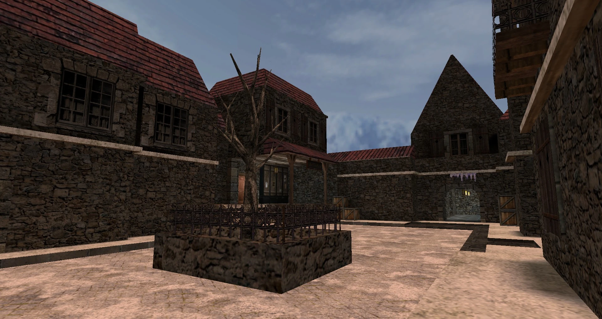 Mittelalterlicher Dorfplatz mit Steingebäuden und kahlem Baum im Half-Life The Last Bullet Updated-Mod