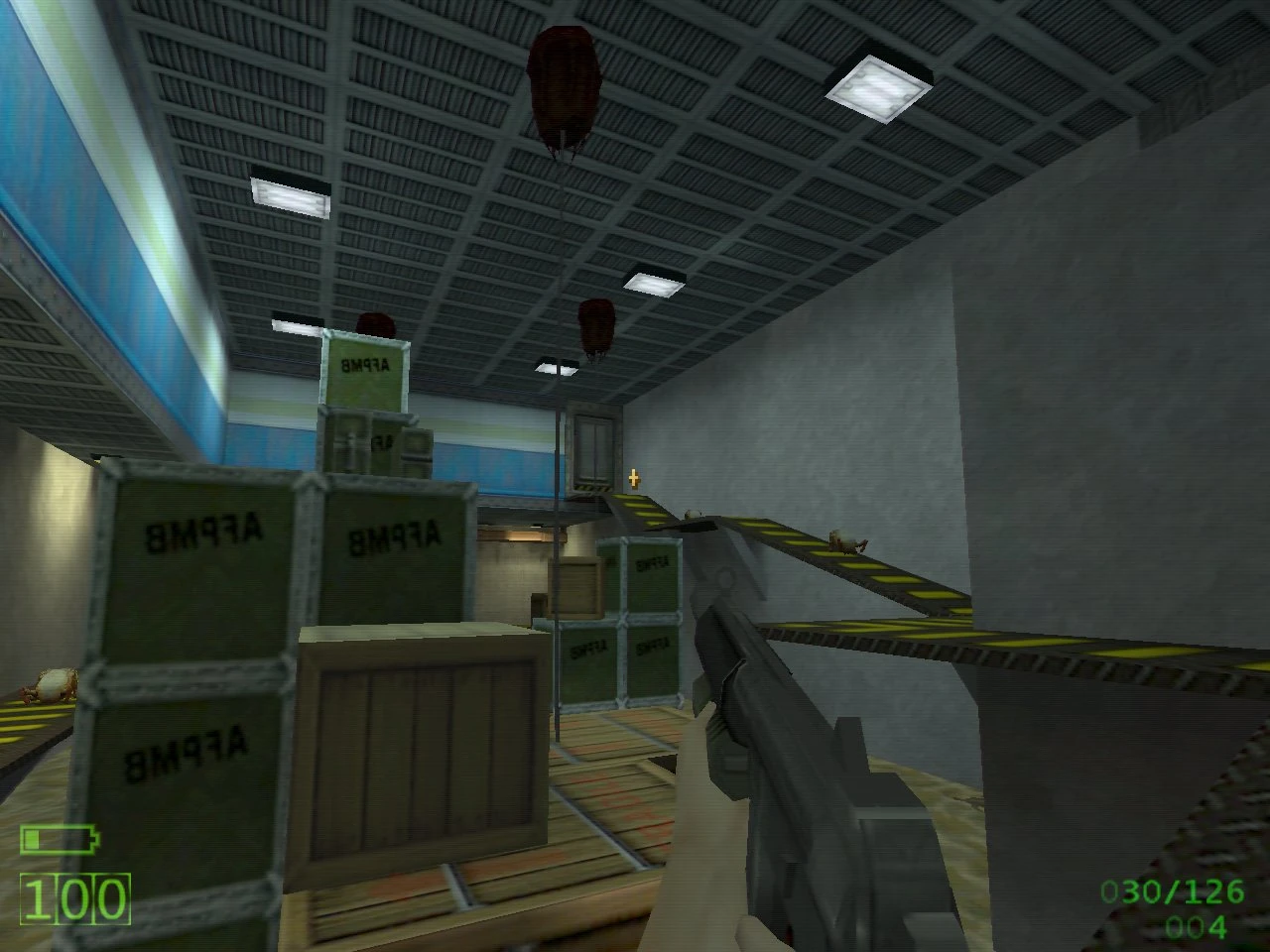 First-person view of Half-Life mod Triphammer showing shotgun aiming at stacked boxes and enemies in an indoor industrial setting