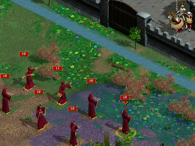 Screenshot from Heroes of Might and Magic III showing multiple units in red robes positioned strategically near a castle wall