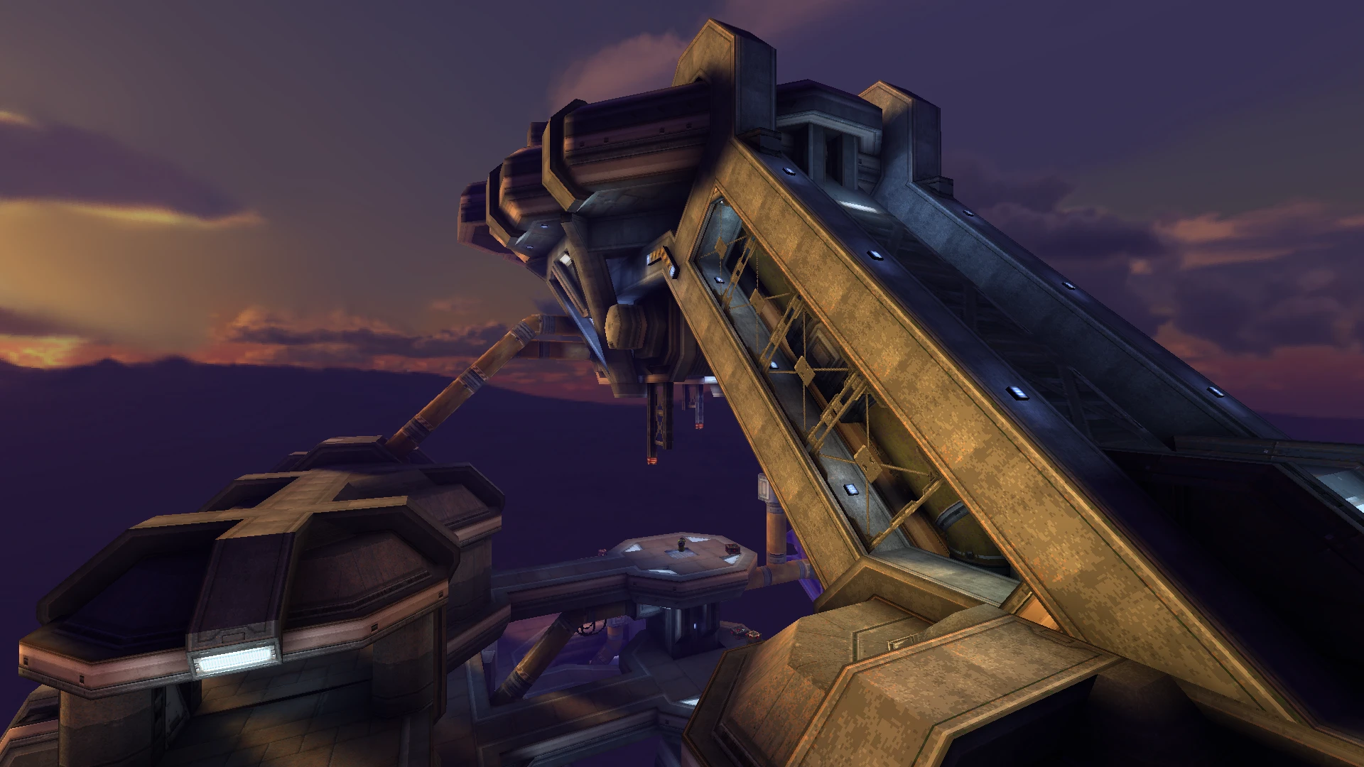 Gran torre industrial con rampas y plataformas en el mod Alkaline de Quake 1996 al atardecer