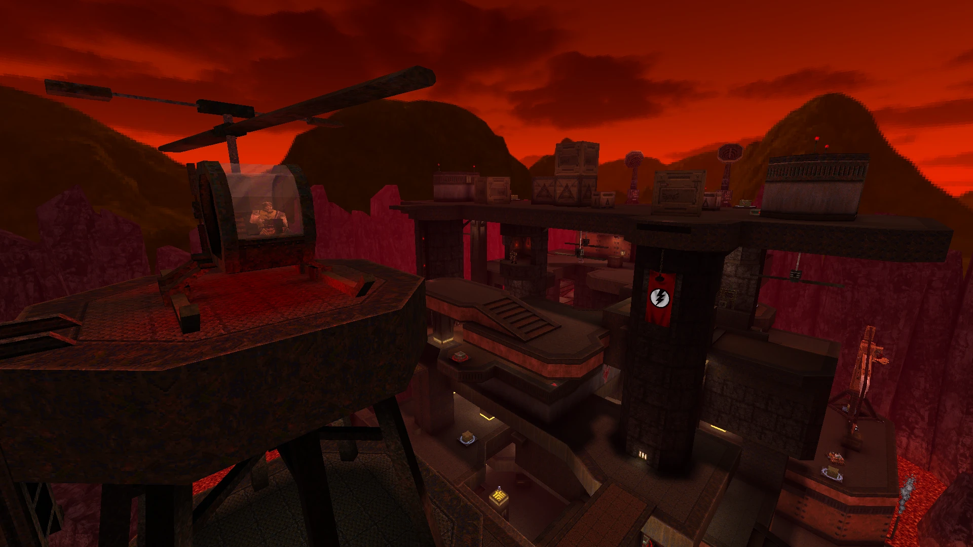Captura del mod Alkaline de Quake 1996 mostrando complejo industrial de varios niveles bajo un cielo rojo
