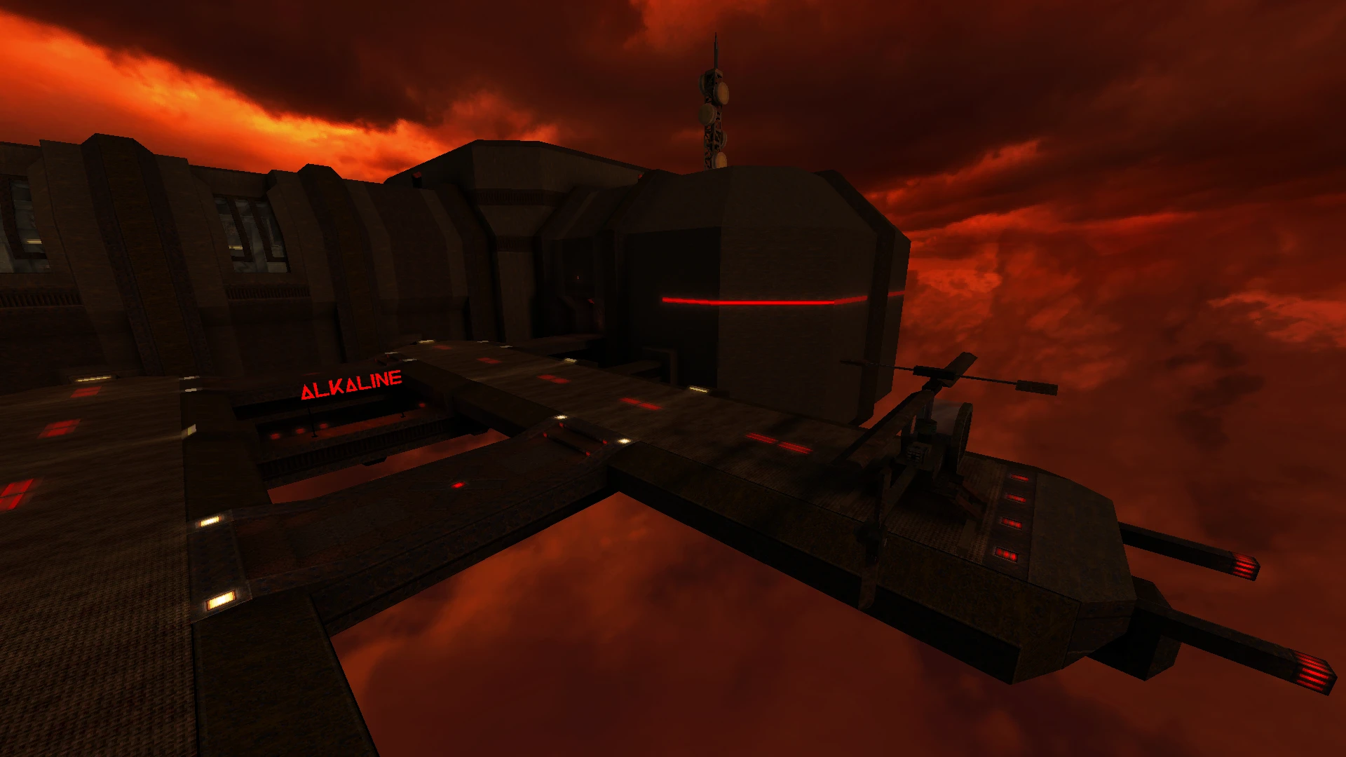 Una plataforma futurista oscura con luces rojas y una torreta blindada bajo un cielo rojo ardiente en el mod Alkaline de Quake