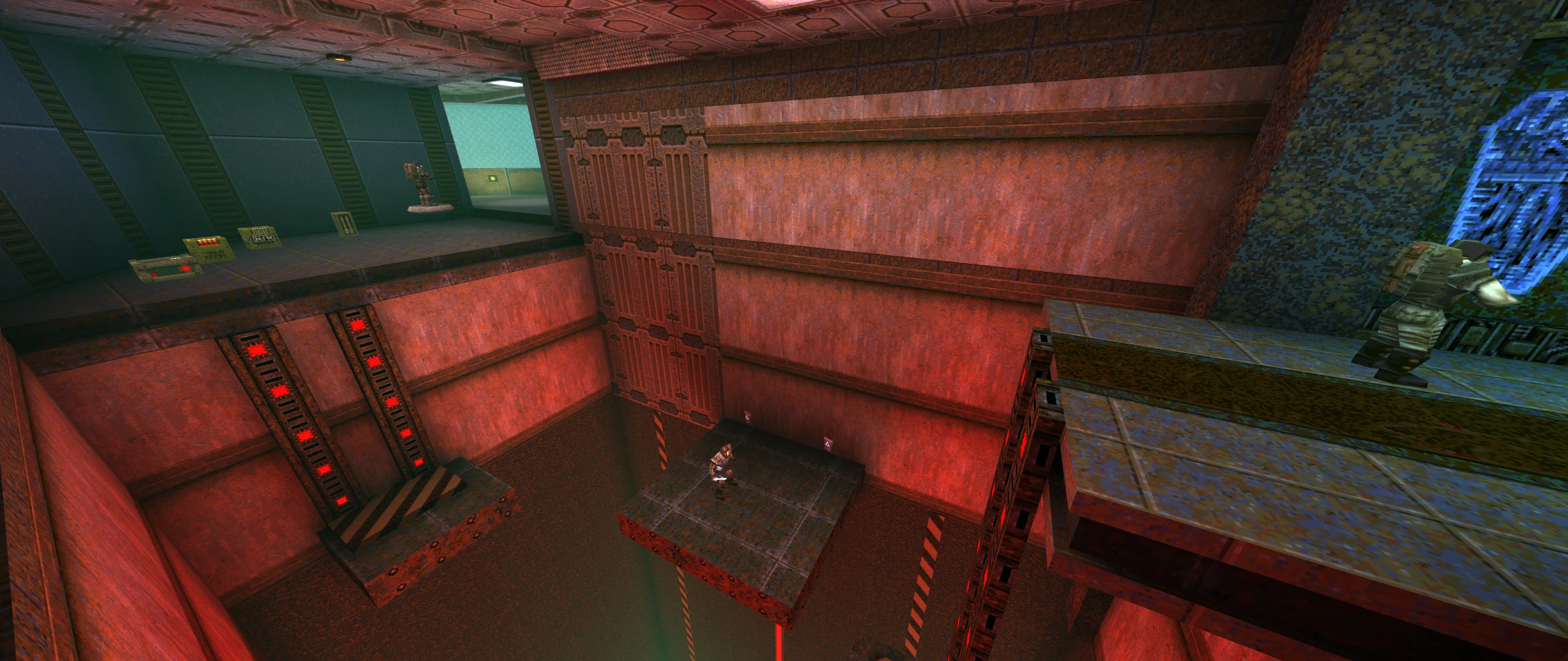 Zrzut ekranu z dwoma żołnierzami na futurystycznej przemysłowej arenie z platformami i czerwonymi ścianami w modzie Antigravity Jam do Quake
