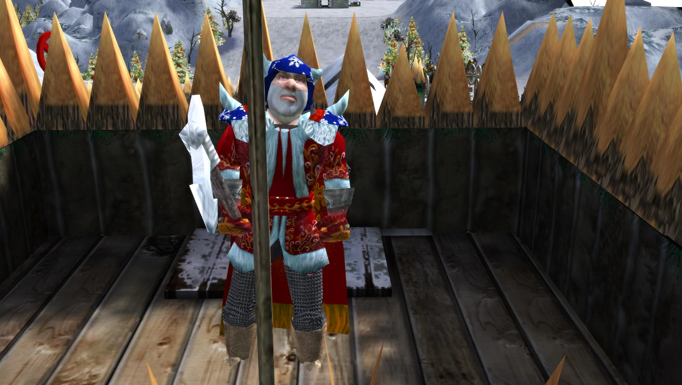 Ein festlicher Wächter in buntem Outfit steht auf einer Holzplattform, umgeben von Stacheln, in einer verschneiten Landschaft in Stronghold 2.