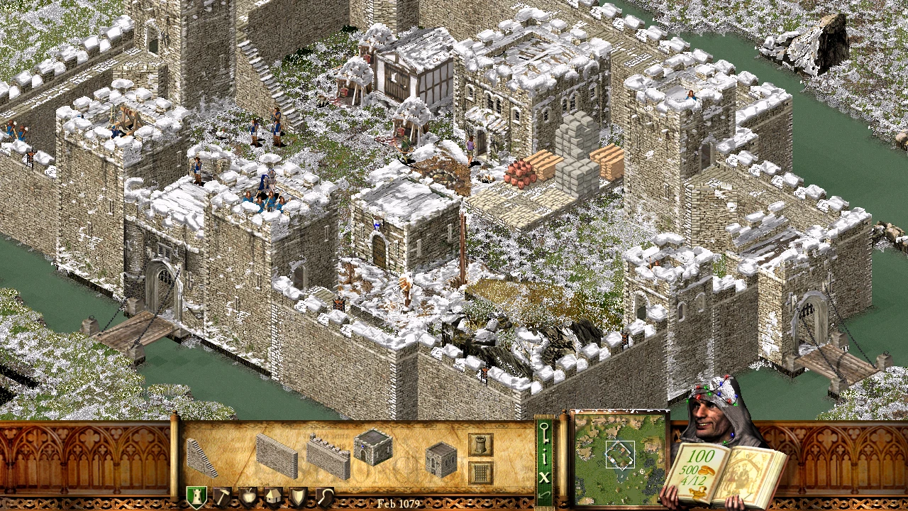 Засніжений замок з будівлями та селянами в Stronghold HD - Winter Mod.